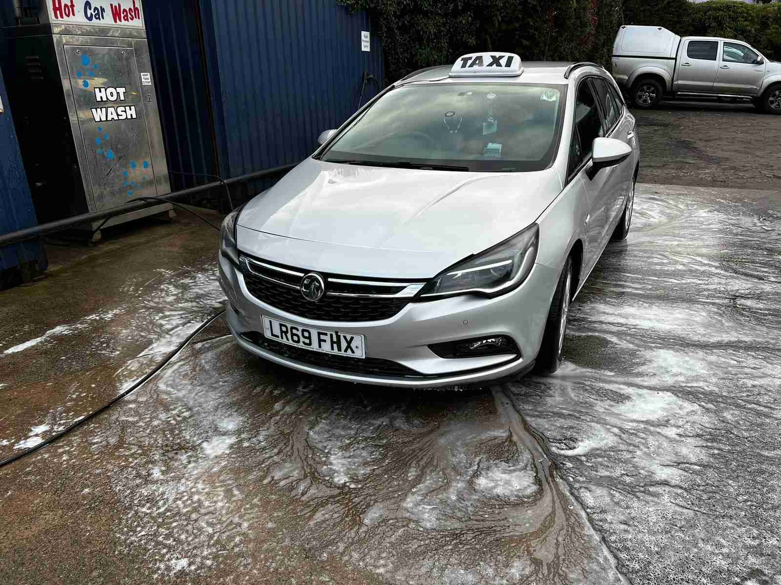 Talgarth-Taxi-Cars2 A silver Talgarth Taxis car being washed at a car wash
